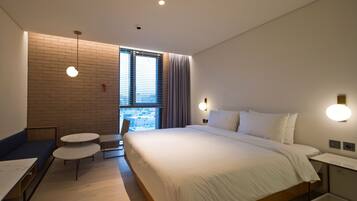 Premium bedding, down comforters, memory foam beds, in-room safe