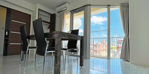 Standard Quadruple Room, Kitchen | Living area | Flat-screen TV - G-RATIS Omoromachi (Naha)