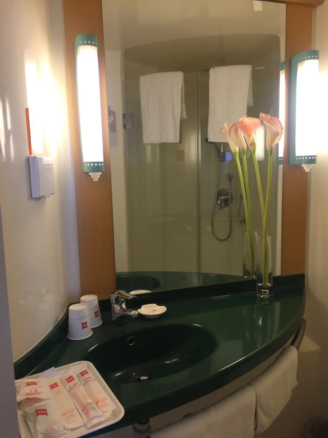 Shower, free toiletries, hair dryer, slippers