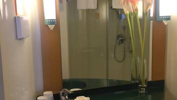 Shower, free toiletries, hair dryer, slippers