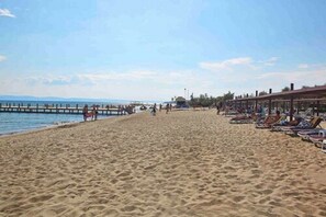 Private beach, sun loungers, beach umbrellas