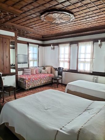 Family Room | Egyptian cotton sheets, premium bedding, individually decorated