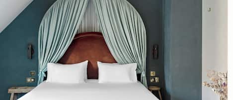 Luxe beddengoed, een minibar, een kluis op de kamer