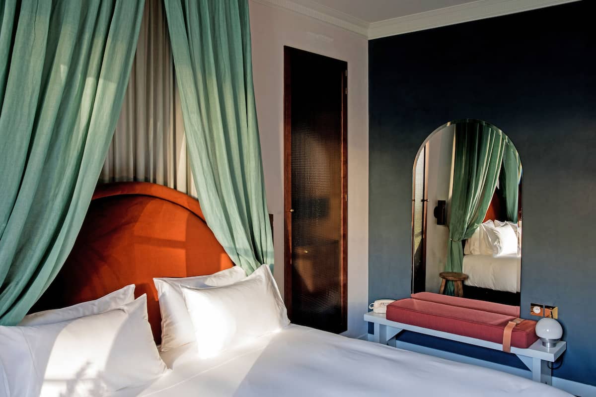 2 habitaciones, ropa de cama de alta calidad y minibar
