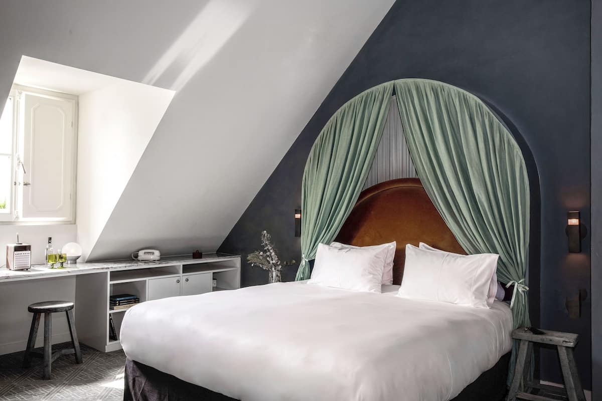 2 habitaciones, ropa de cama de alta calidad y minibar