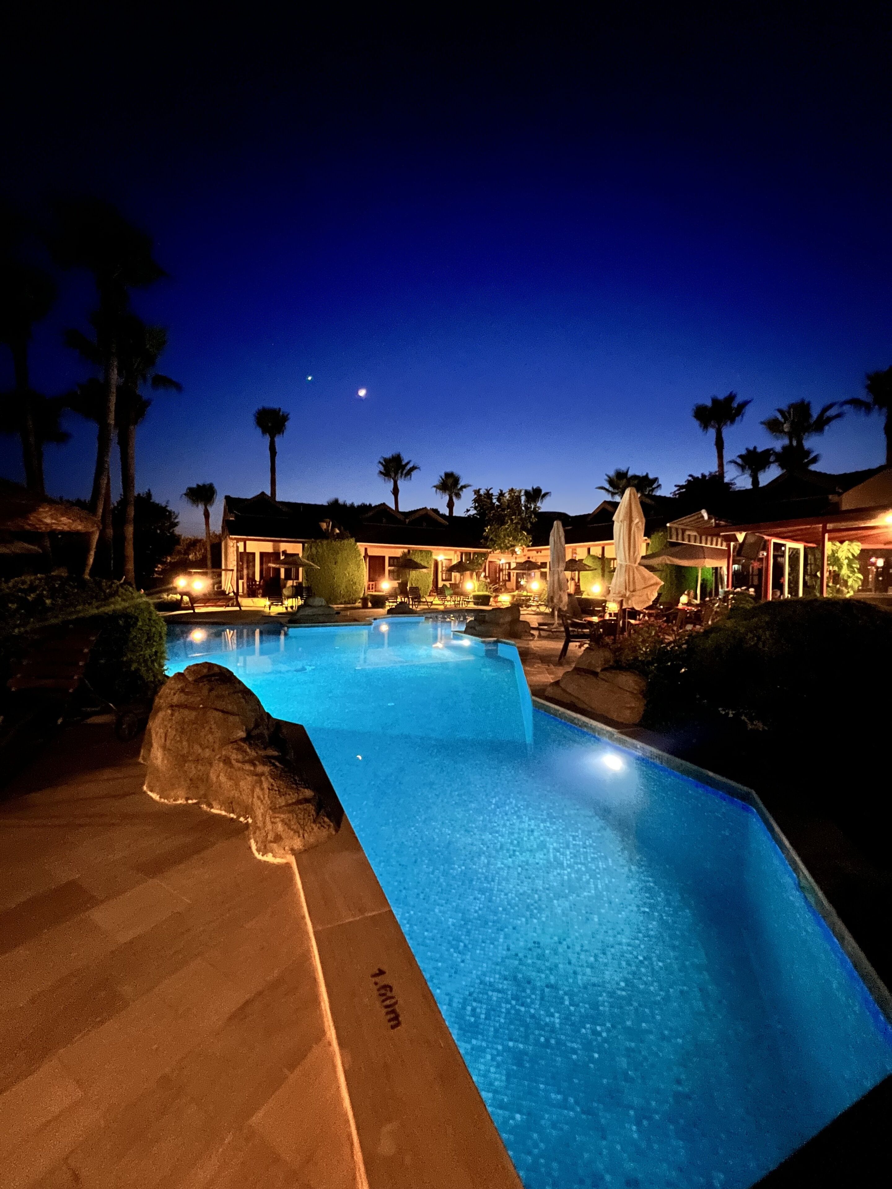 outdoor pool, pool umbrellas, pool loungers