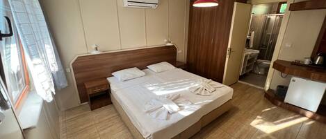Standard Double or Twin Room, Garden View | 1 bedroom, in-room safe, blackout drapes, free WiFi