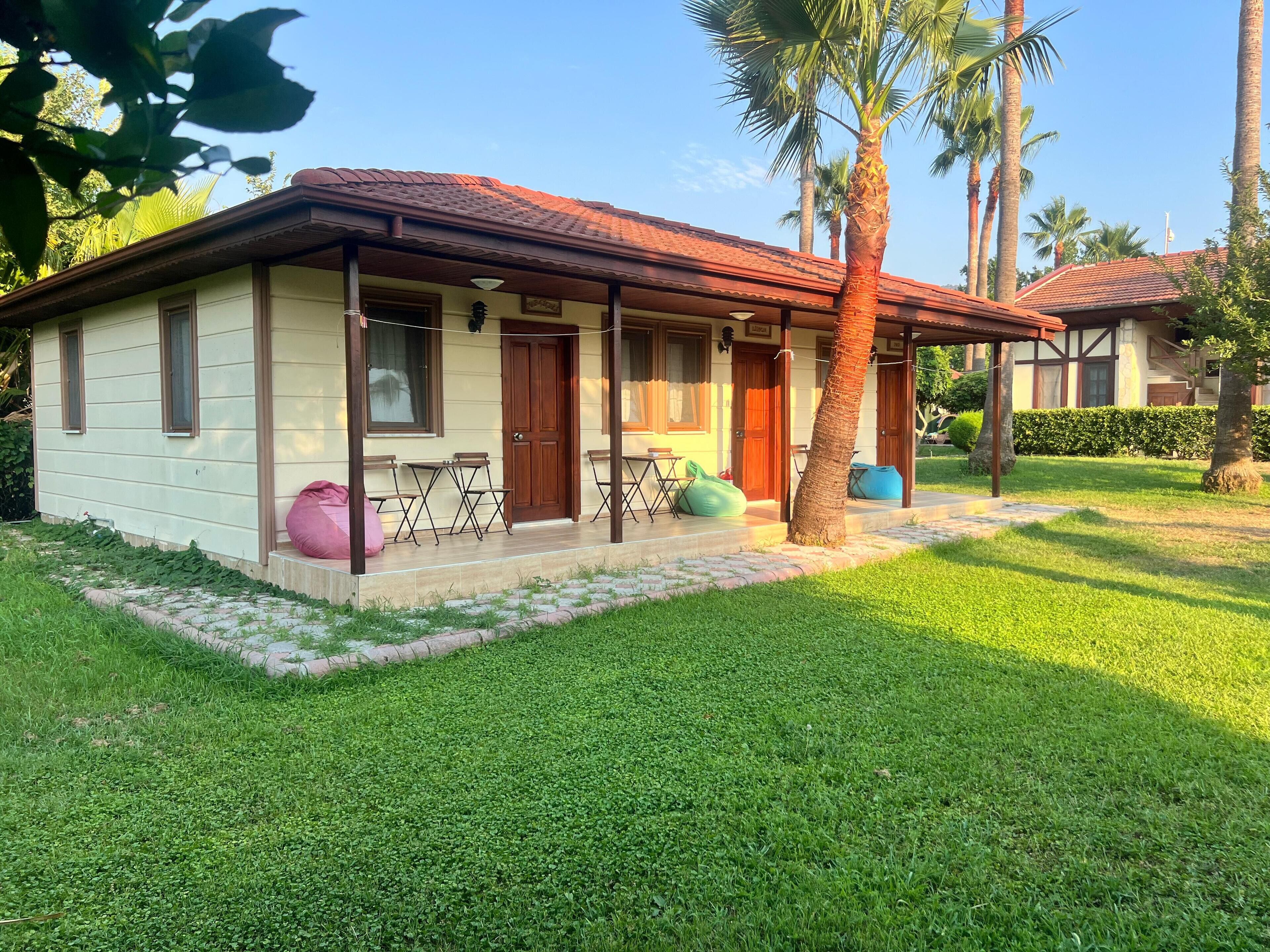 suite, garden view | 1 bedroom, in-room safe, blackout curtains, free wifi