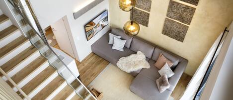 Exclusive-alpehytte - 2 soveværelser | Opholdsområde | Fladskærms-tv, pejs