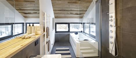 Exclusive Chalet, 2 Bedrooms | Bathroom | Jetted tub, free toiletries, hair dryer, bathrobes