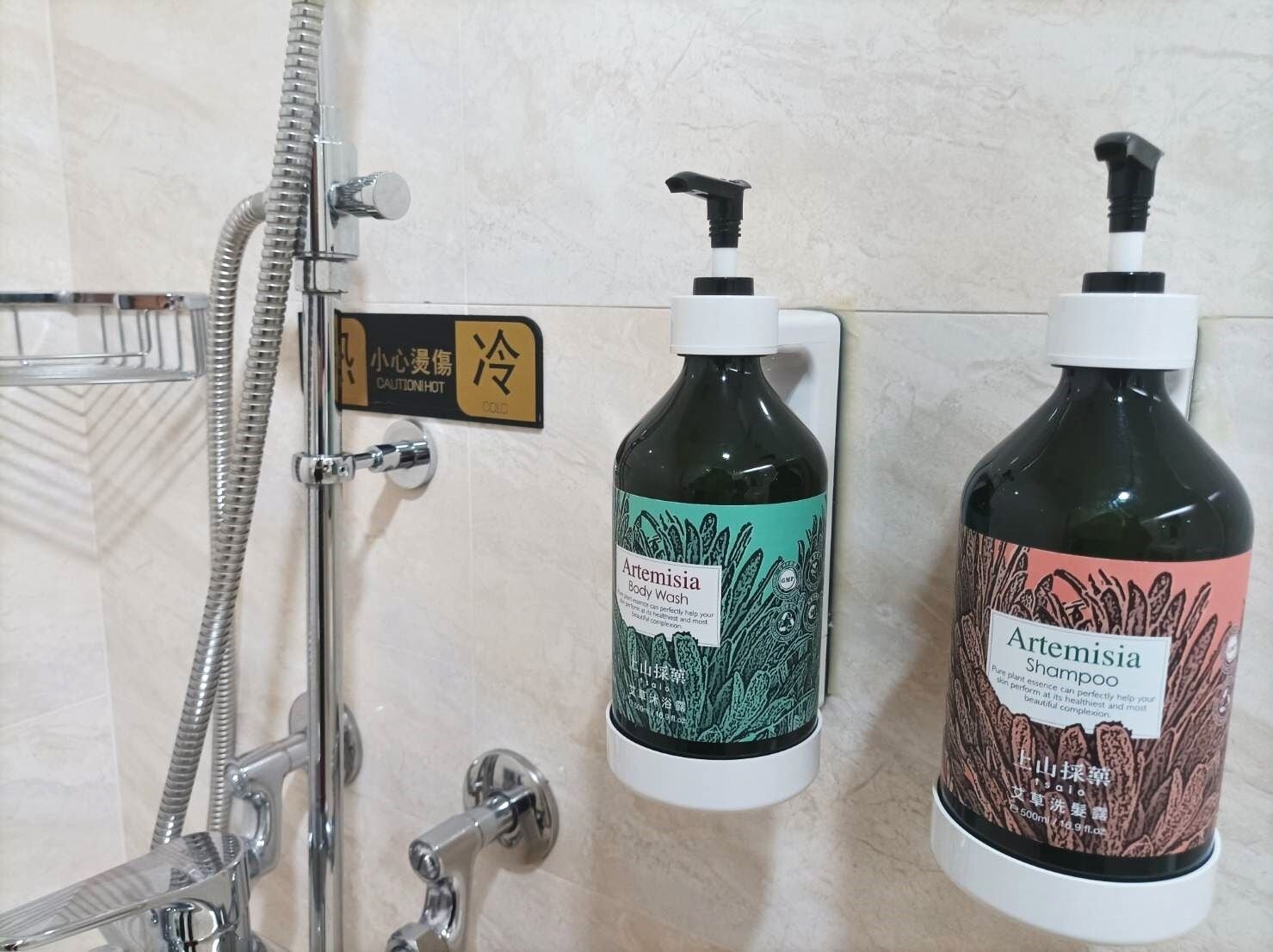 shower, rainfall showerhead, hair dryer, towels