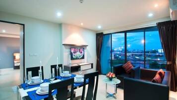 39-inch flat-screen TV with cable channels, TV, books