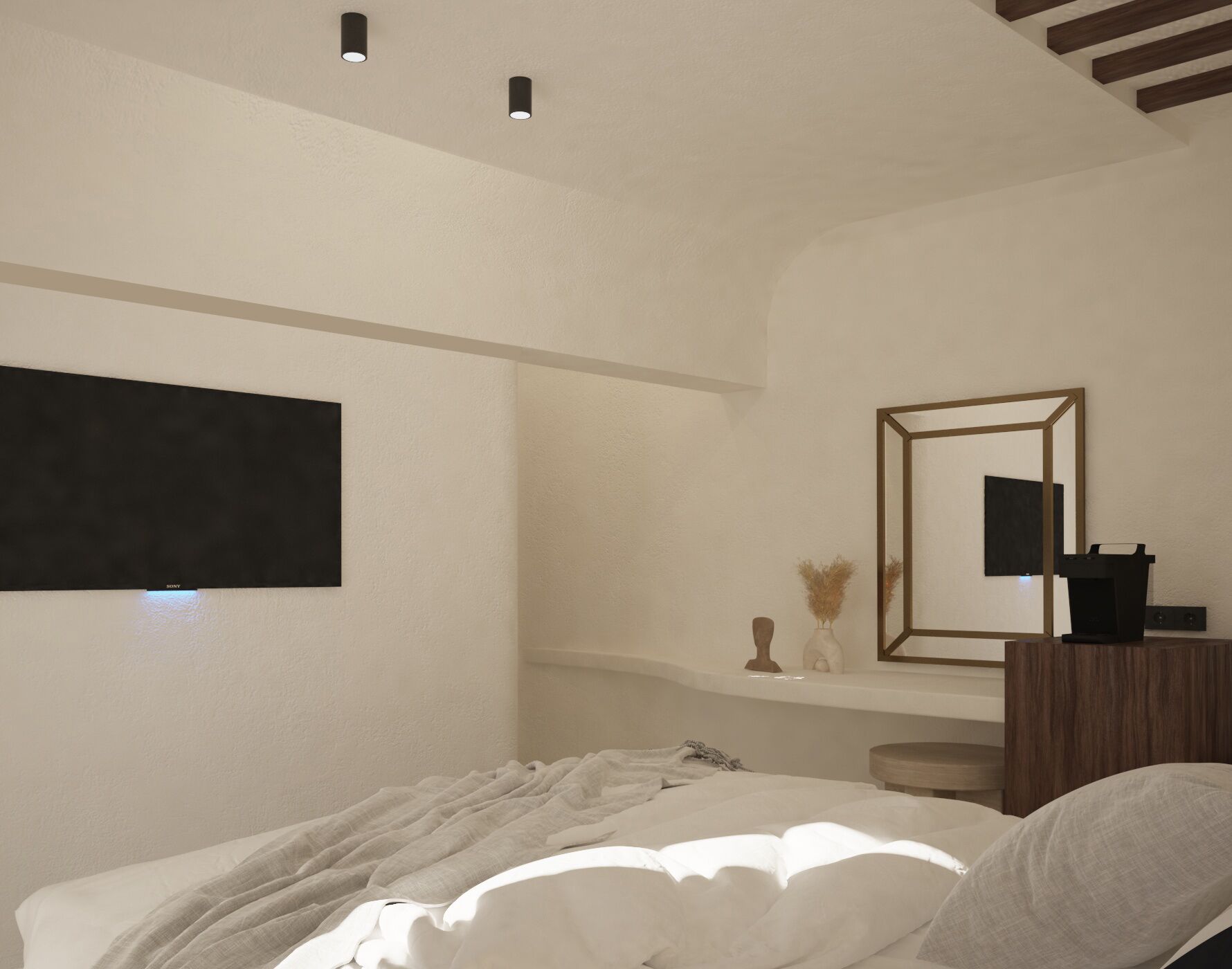 A bedroom with a bed, a bedside table, a mirror, and a wall-mounted TV.