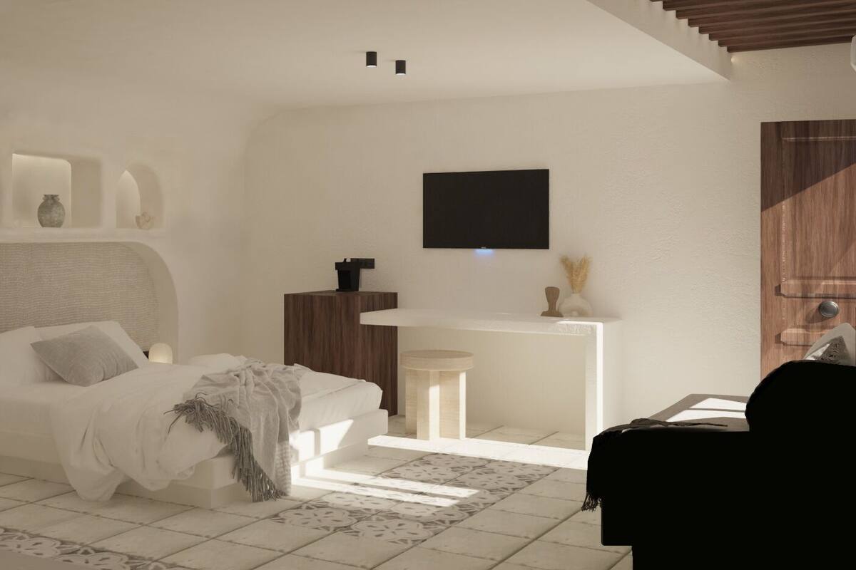 Ein modernes Schlafzimmer mit Bett, Nachttisch und einem an der Wand befestigten Flachbildfernseher.
