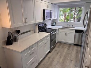 Private kitchen - Coconut Palms Townhome 2 Bedroom Townhouse by RedAwning (New Smyrna Beach)