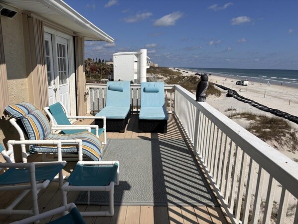 House, 4 Bedrooms | Property grounds - Ocean Front Beach Walking Distance To Flagler 4 Bedroom Home by RedAwning (New Smyrna Beach)