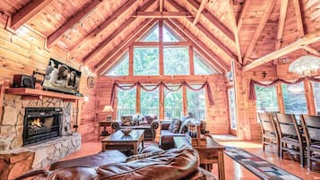 Cabin, 3 Bedrooms | Living area | TV, fireplace