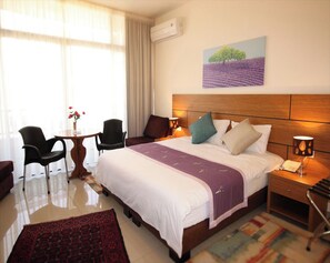 Premium Double Room | Free minibar items, in-room safe, desk, blackout drapes