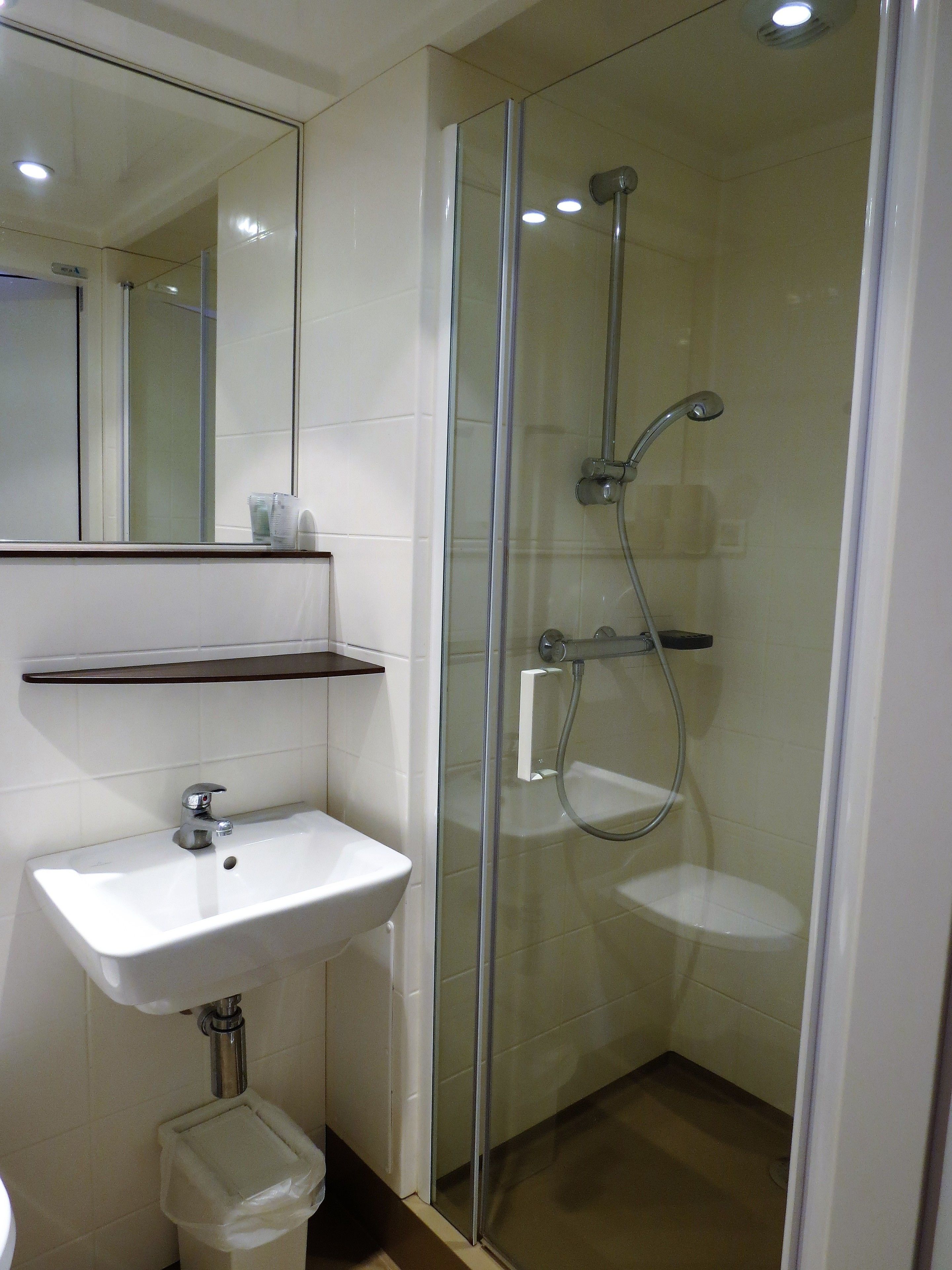 quadruple room | bathroom | shower, rainfall showerhead, free toiletries, towels