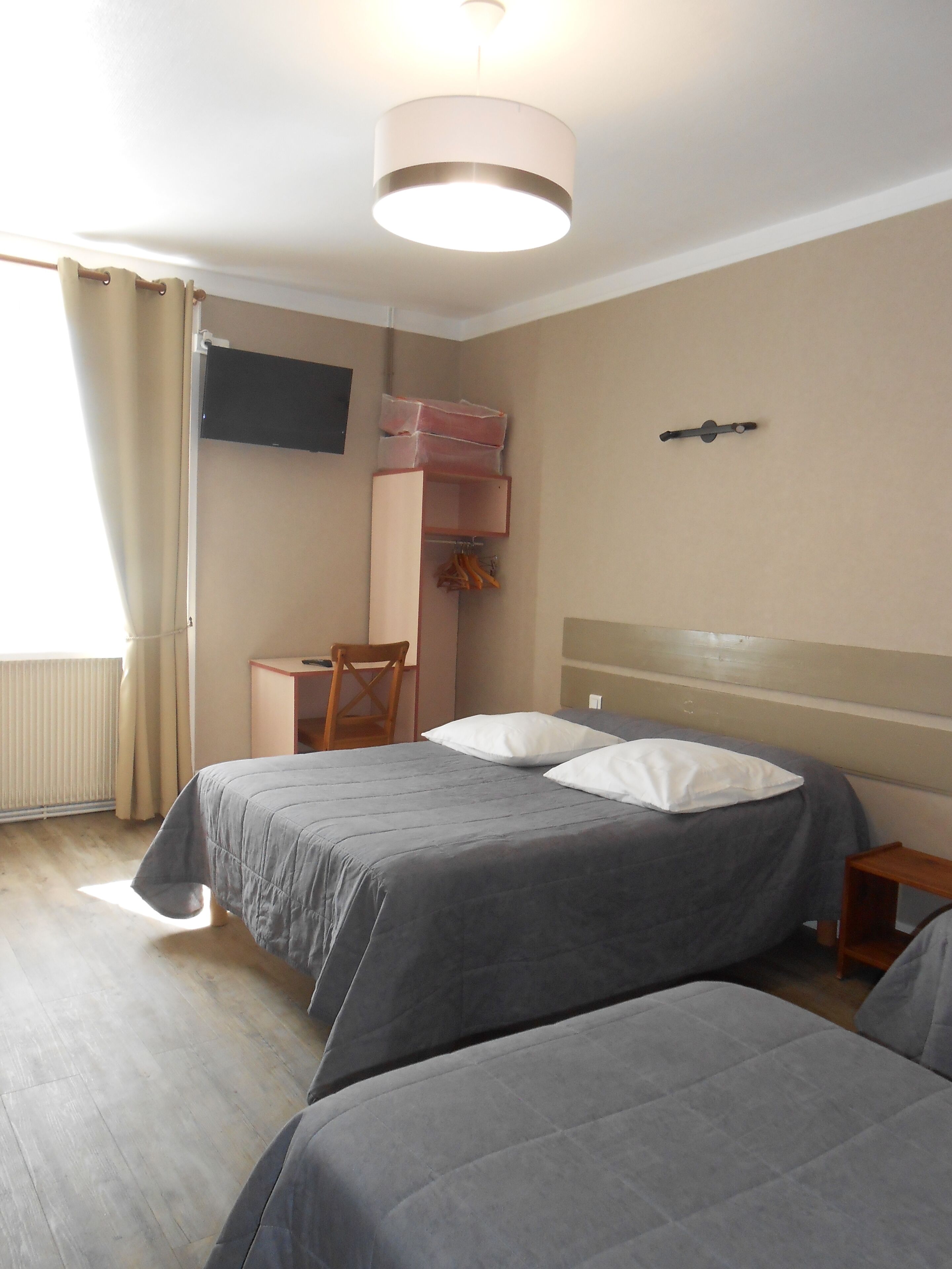 quadruple room, private bathroom | desk, free wifi, bed sheets