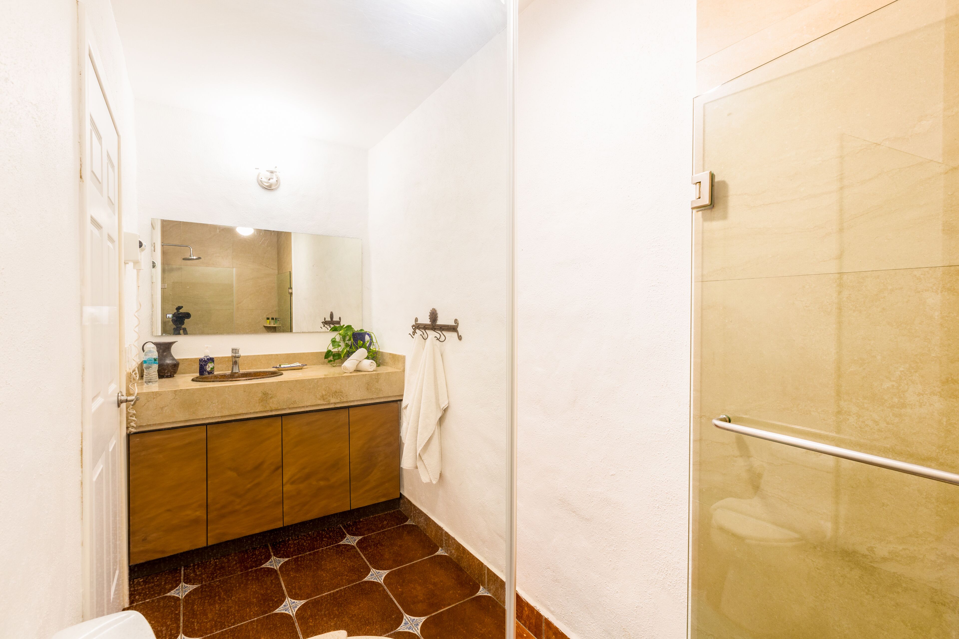 family suite with kitchenette and walk to pool | bathroom | shower, free toiletries, hair dryer, towels