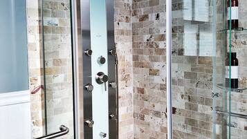 Suite Deluxe, 1 trÚs grand lit, salle de bains privée | Douche de la salle de bain
