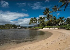 On the beach, sun loungers, beach towels