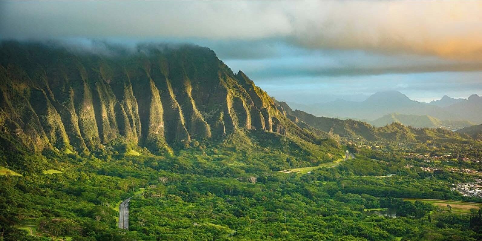 A mountainous landscape with a winding road.