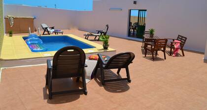 Spacious, quiet house with heated pool and large garden.