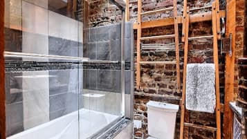 Combined shower/tub, hair dryer, towels, soap