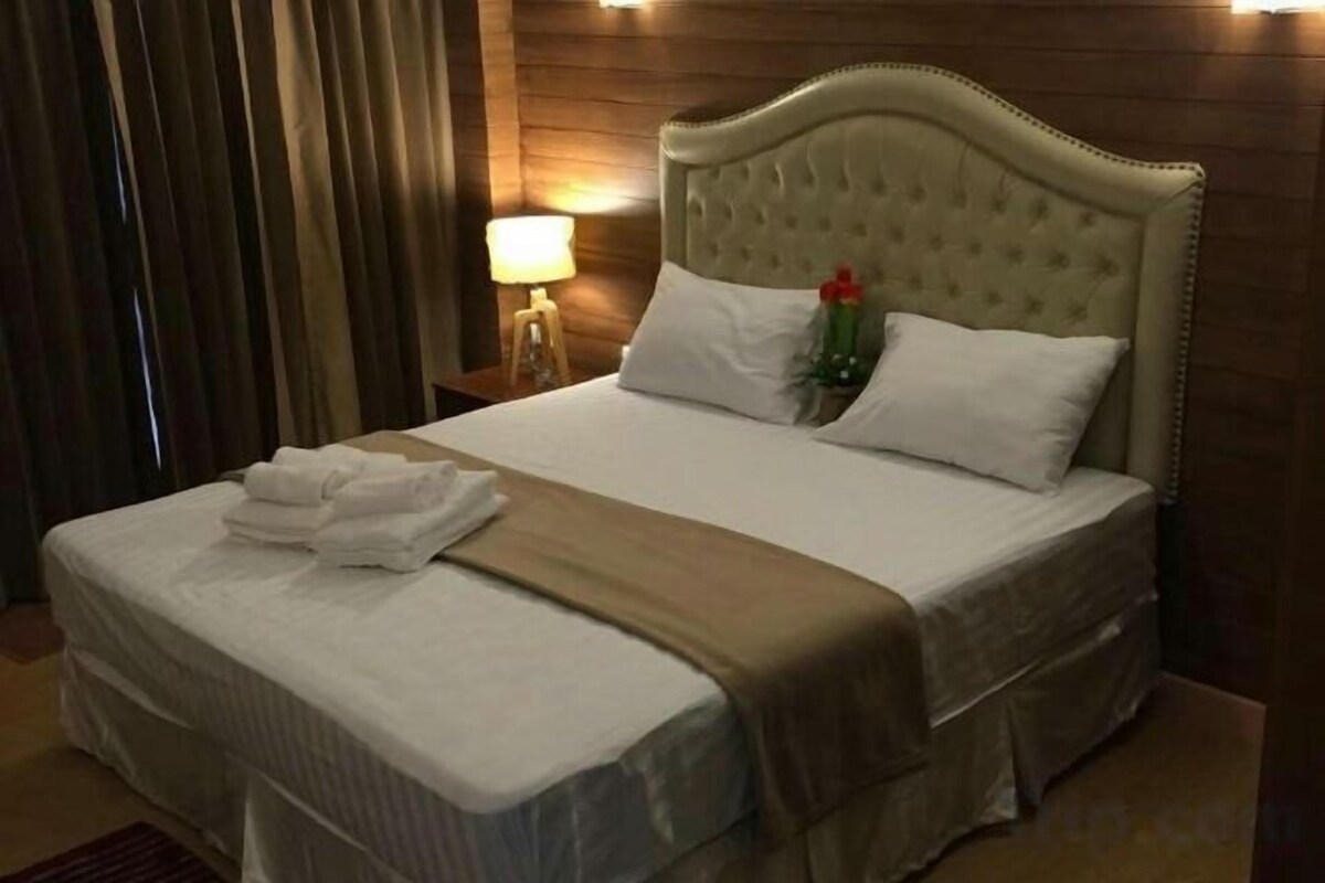 Blackout drapes, soundproofing, WiFi (free), bed sheets