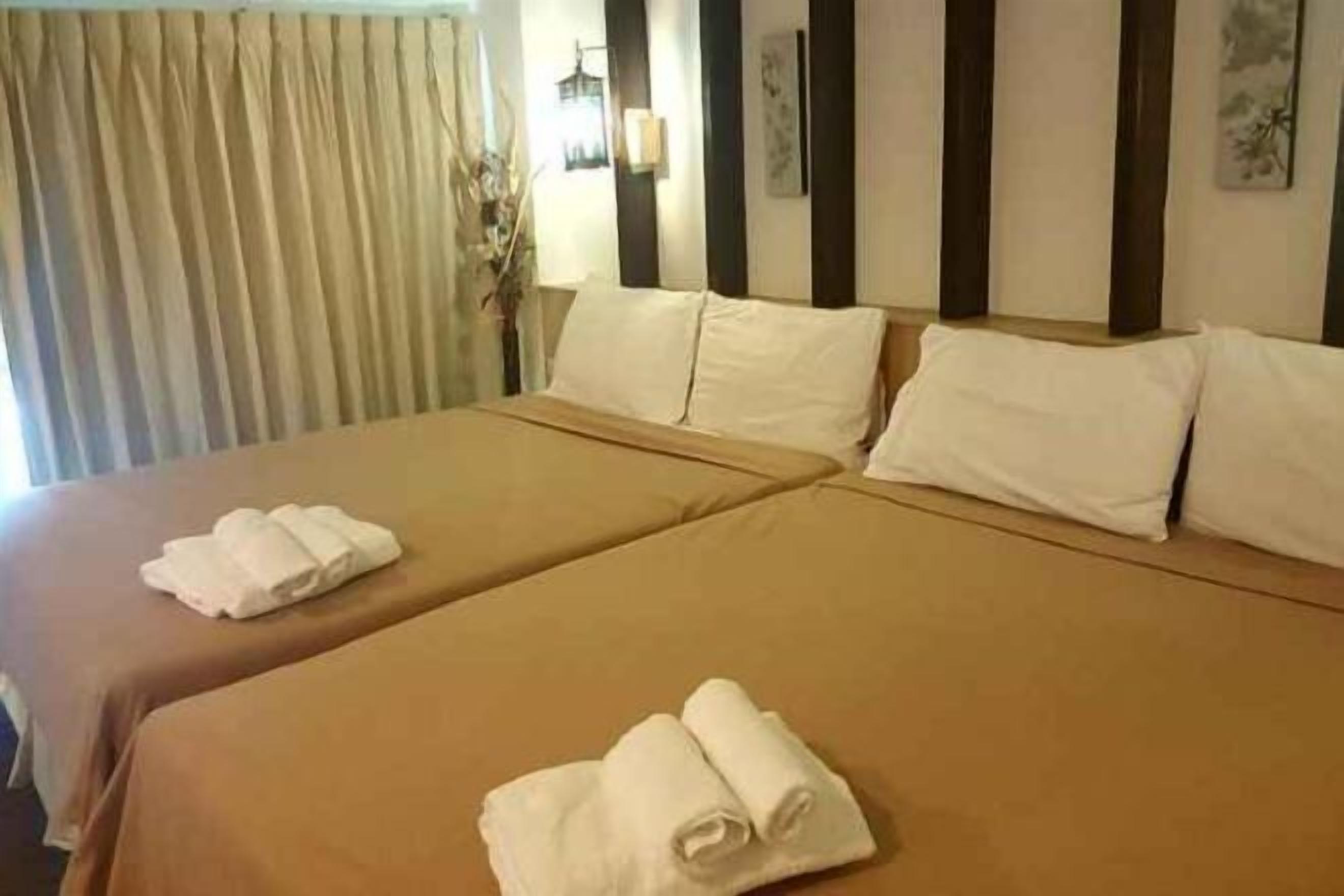 Cortinas blackout, quartos à prova de som, Wi-Fi de cortesia