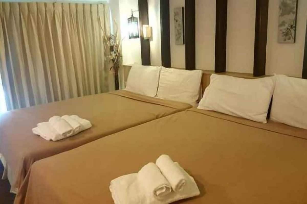 Blackout drapes, soundproofing, free WiFi, bed sheets