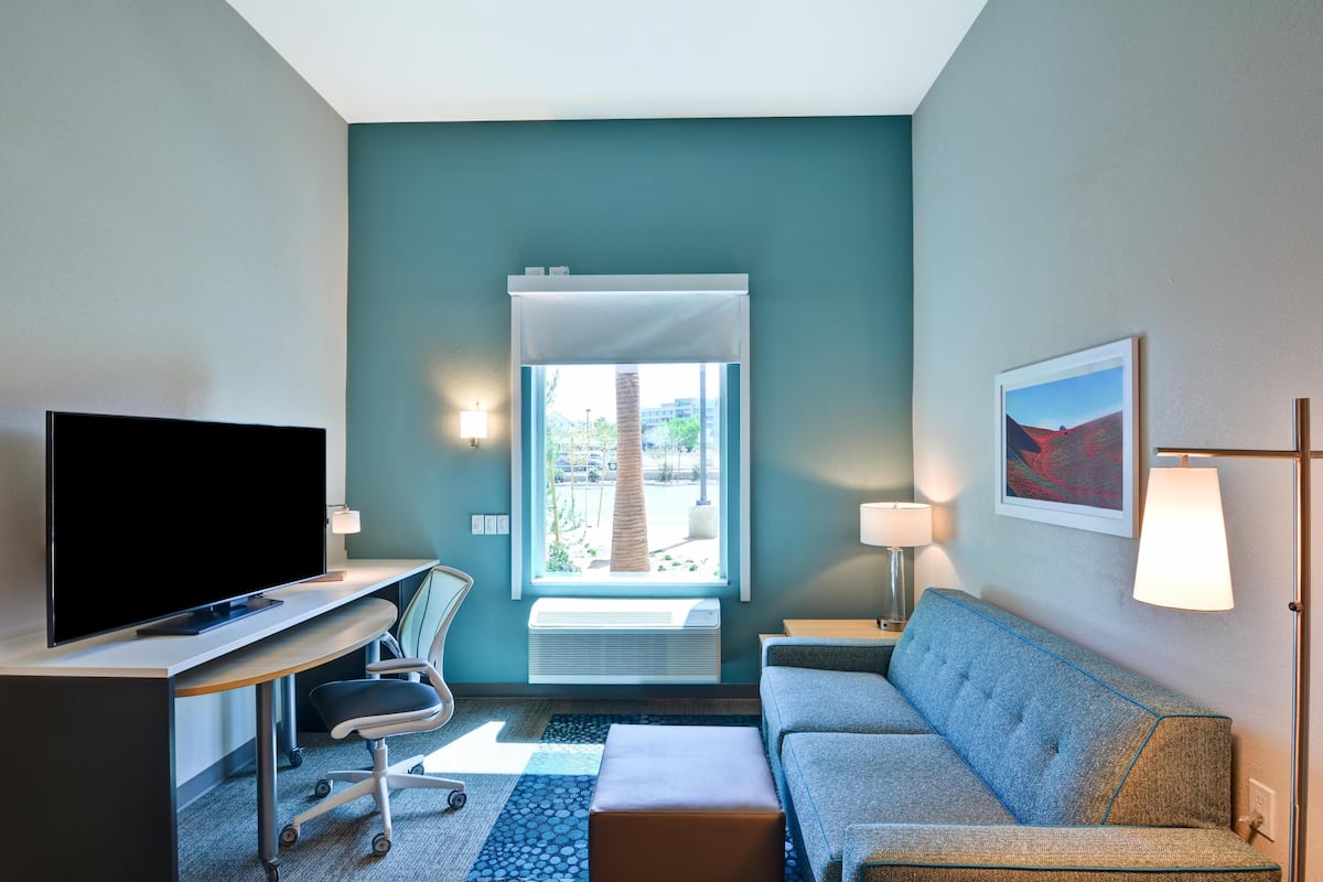 Individually furnished, desk, laptop workspace, blackout curtains