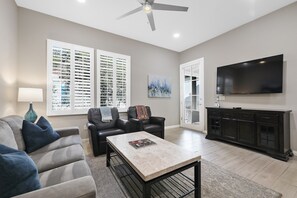 Smart TV, fireplace, DVD player, books