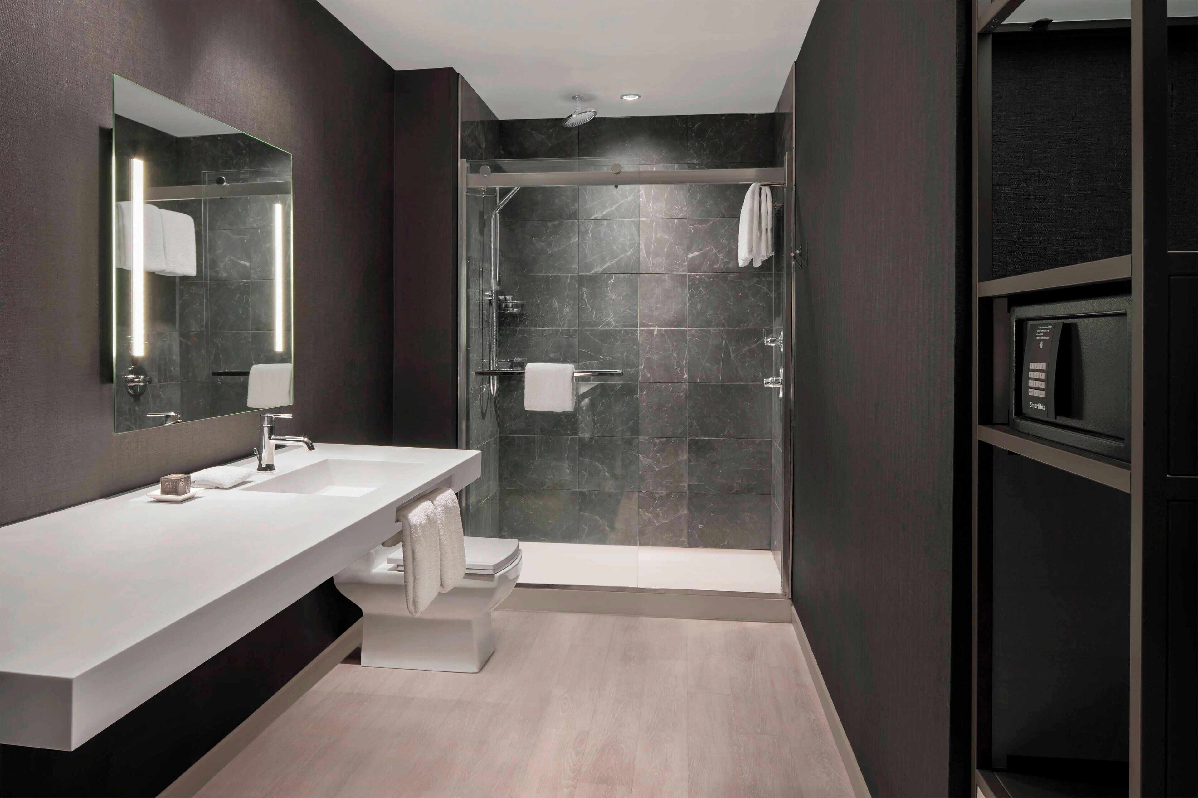 rainfall showerhead, hair dryer, towels