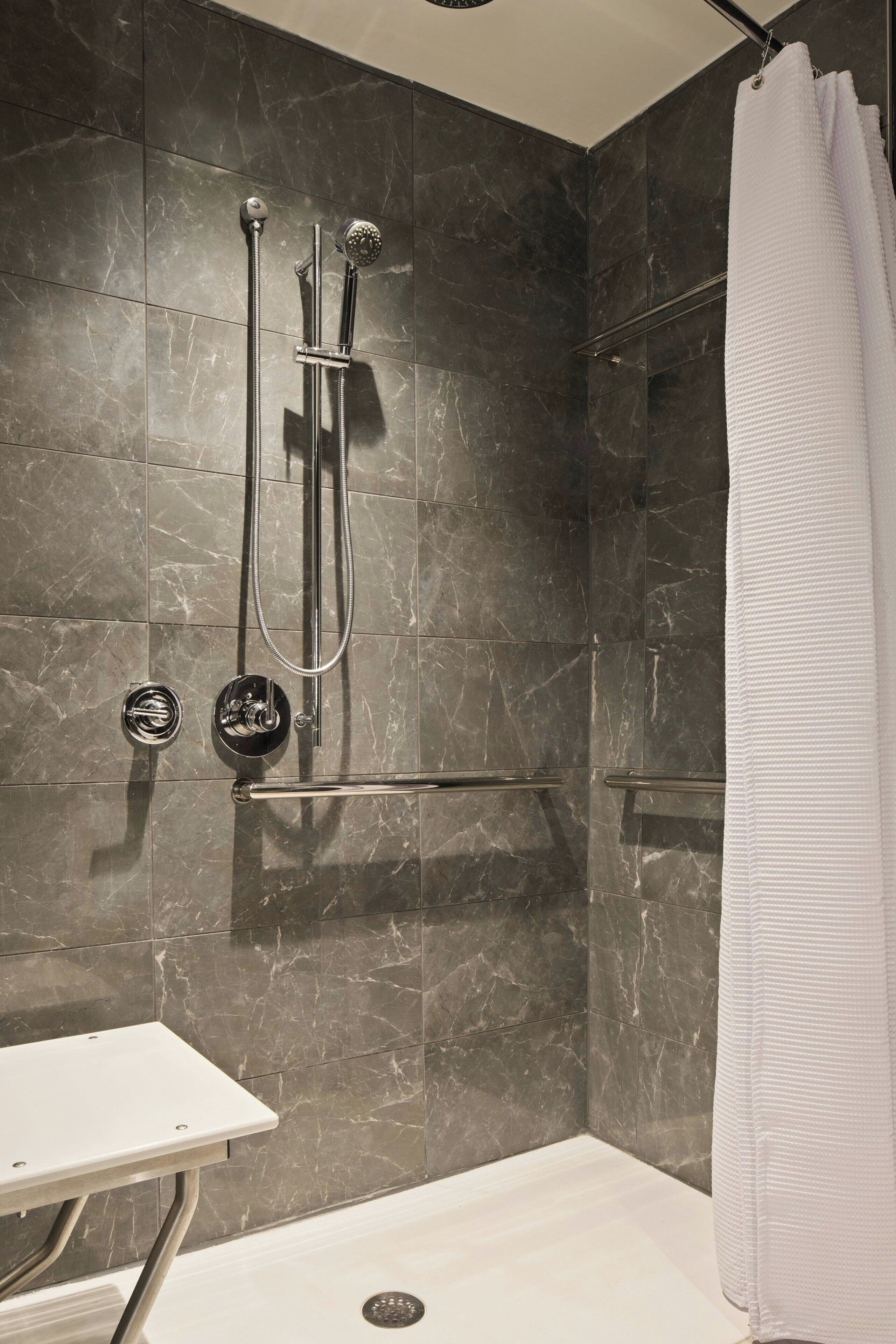 rainfall showerhead, hair dryer, towels