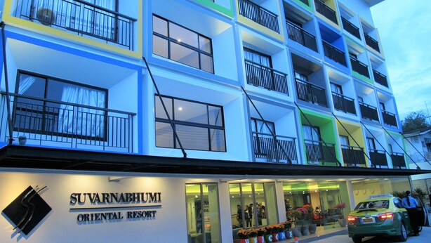 A multi-story hotel with balconies and a sign reading "SUVARNABHUMI ORIENTAL RESORT". - Suvarnabhumi Oriental Resort (Bangkok)