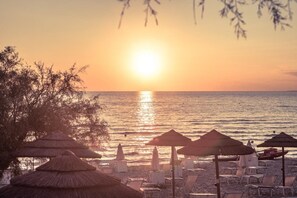 Private beach, white sand, sun-loungers, beach umbrellas
