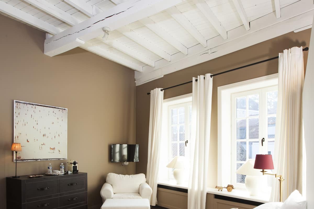 Luxe beddengoed, een kluis op de kamer, individueel gedecoreerd
