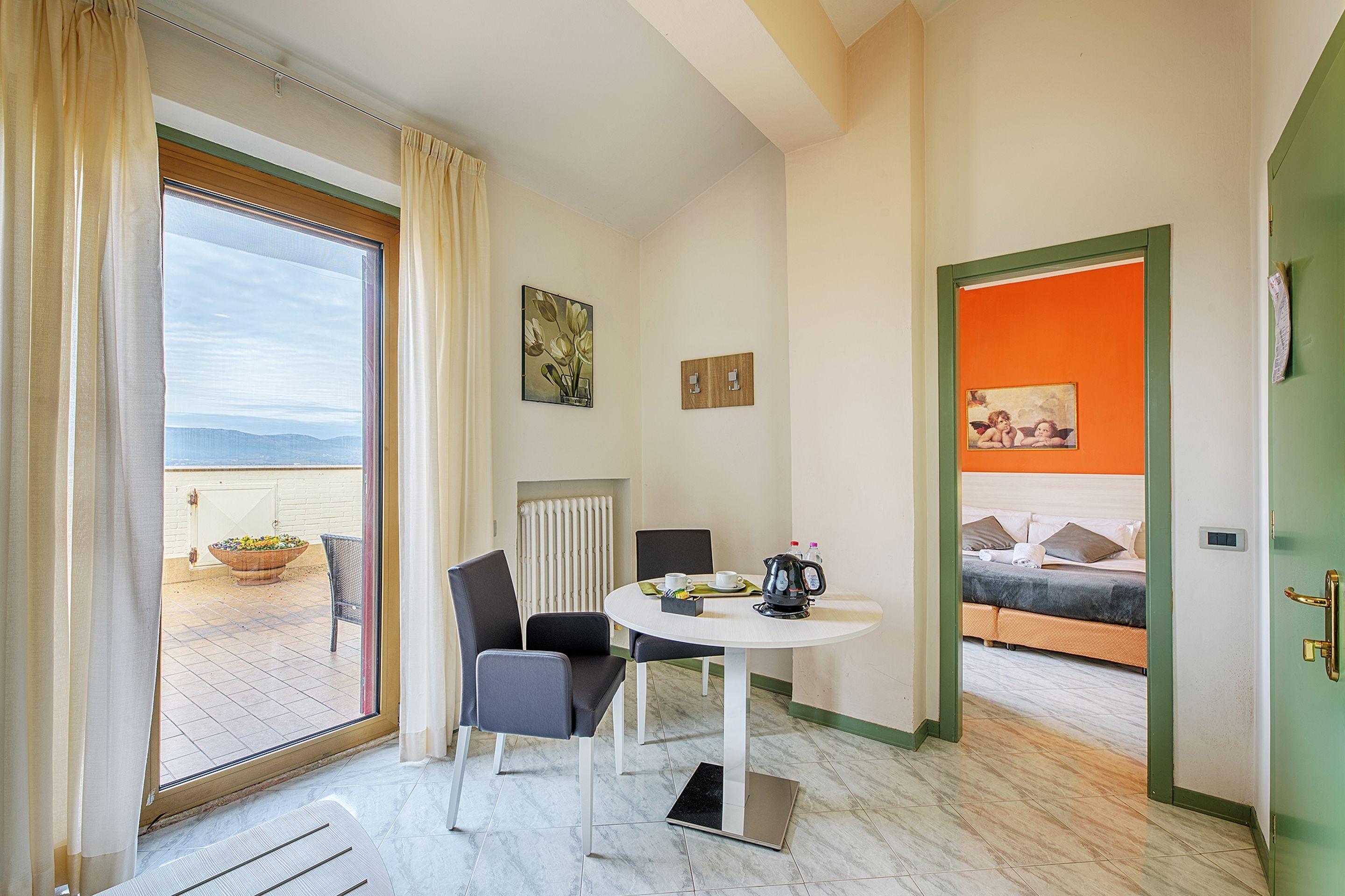 junior studio suite | living area | 19-inch flat-screen tv with digital channels, tv