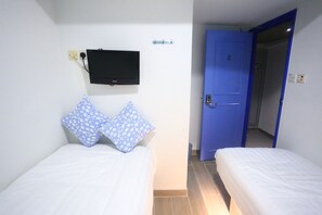Habitación con 2 camas individuales | Wifi gratis y ropa de cama 
