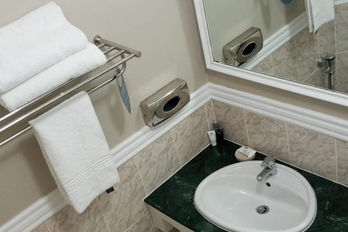 deep-soaking bathtub, free toiletries, towels, soap