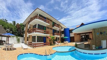 Outdoor pool, pool umbrellas, pool loungers