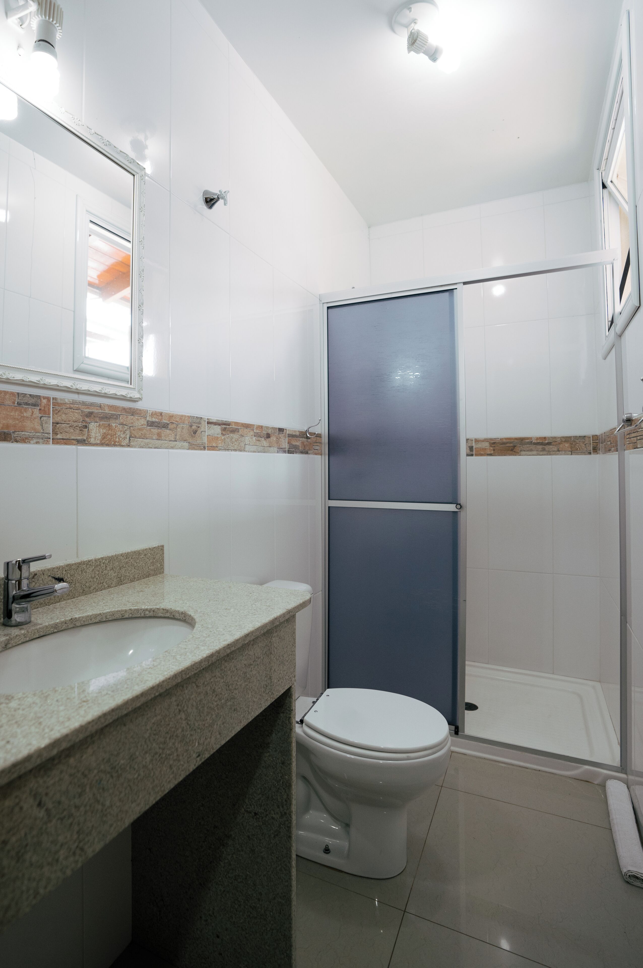 economy single room | bathroom | shower, hair dryer, towels