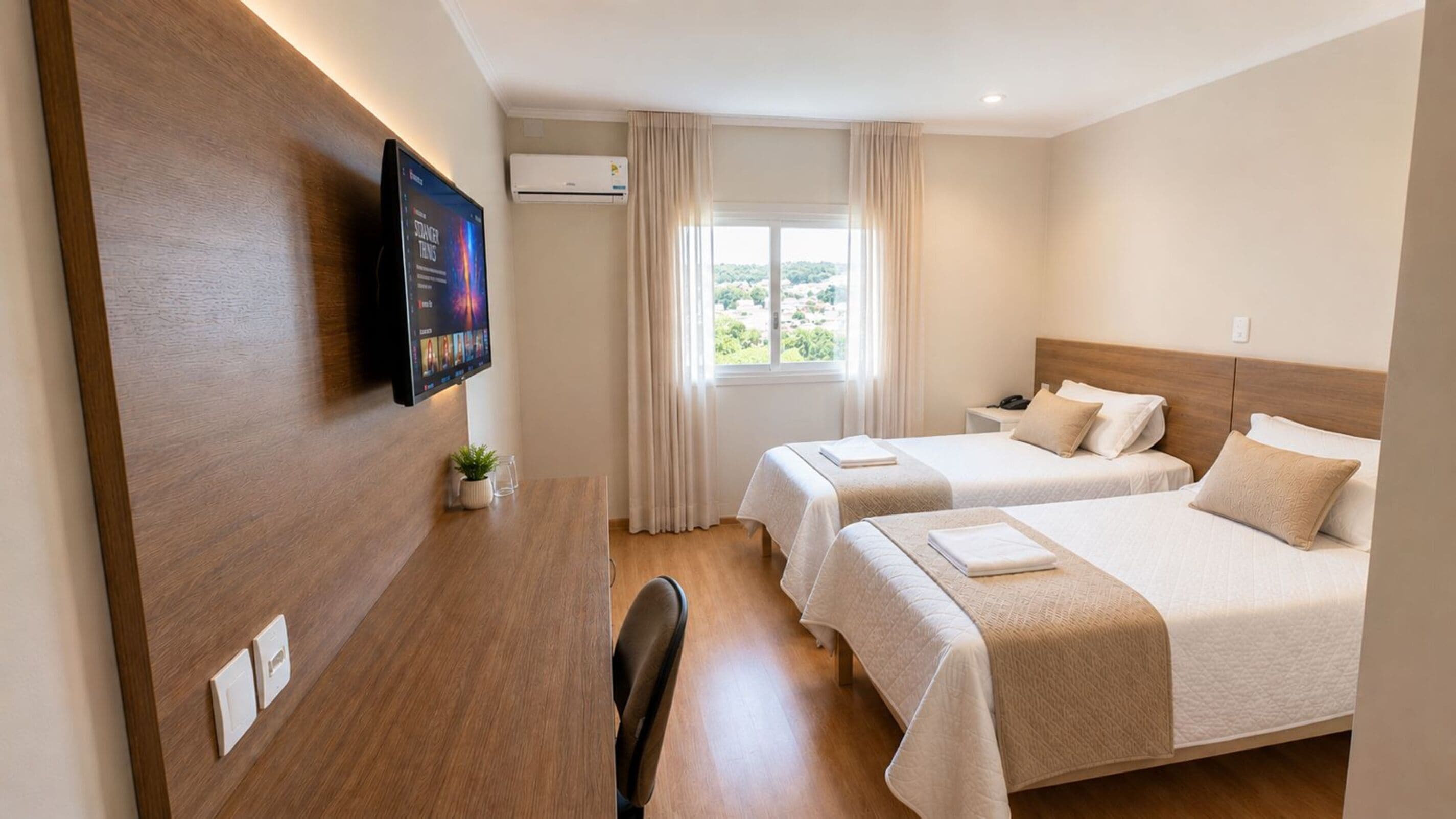 Deluxe enkelrum - 2 enkelsängar | Minibar, mörkläggningsgardiner, ljudisolering och gratis wi-fi