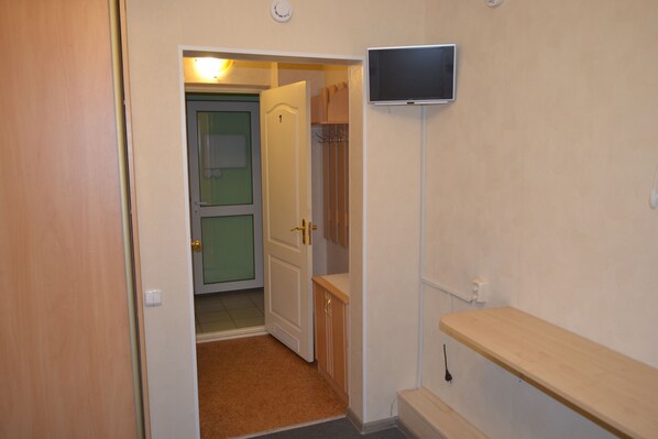 Economy Single Room, No Windows | Living area | Flat-screen TV - Rassvet (Saransk)