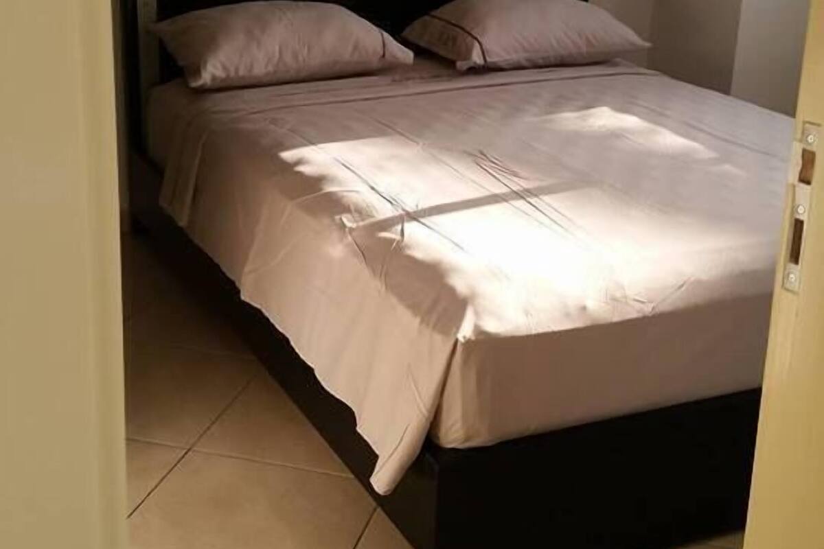 Premium bedding, blackout curtains, free WiFi, bed sheets