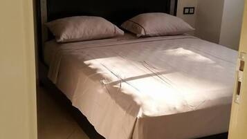Premium bedding, blackout curtains, free WiFi, bed sheets