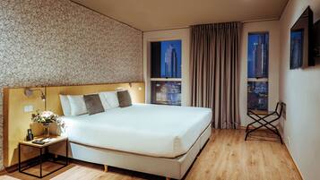 Ropa de cama de alta calidad y minibar